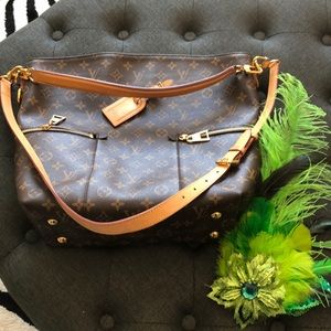 Melie Louis Vuitton.